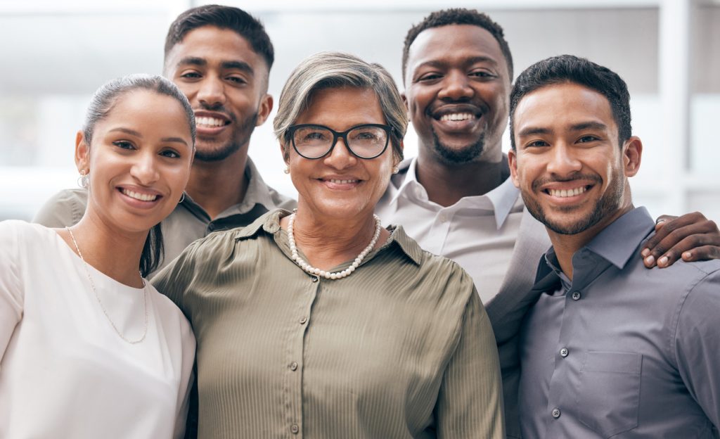 A group of people smiling at the camera
